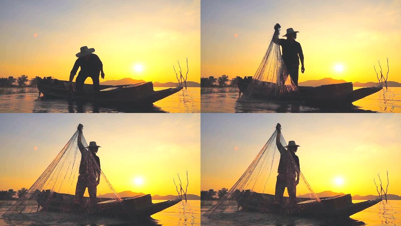 高清慢动作: 日落时乘船钓鱼的渔夫