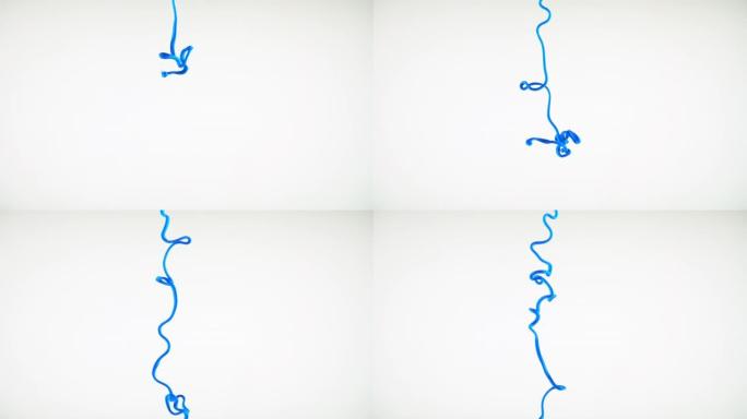 SLO MO LD蓝色被从管子中挤出到清水中