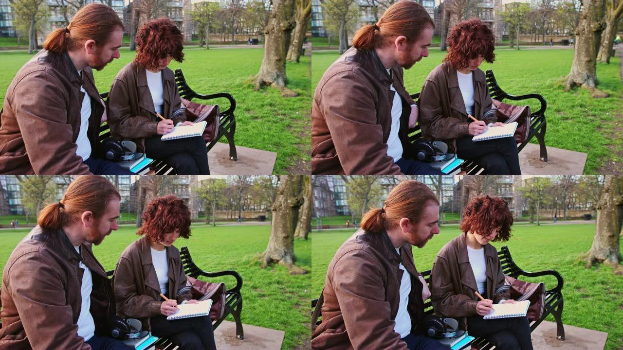 两名研究生在公园长凳上讨论工作的慢动作镜头