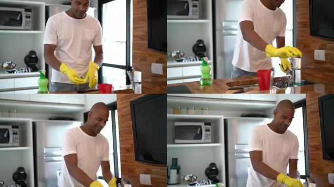 非洲裔西班牙裔拉丁裔男子在家洗碗