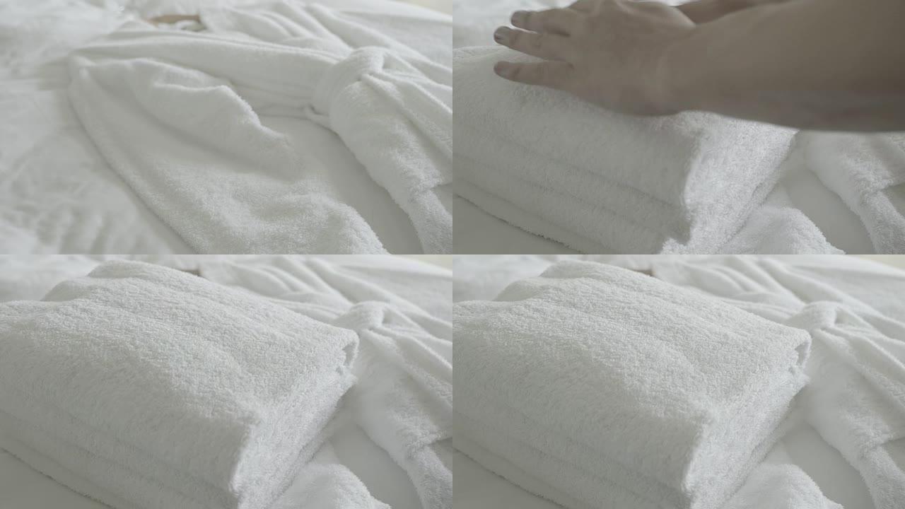 在床上放新鲜毛巾