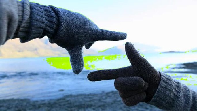 近距离拍摄人类的山湖景观