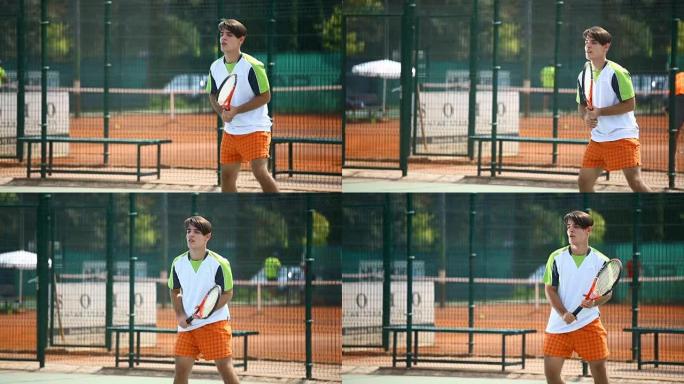 网球比赛。外国人外国男士男人打球击球