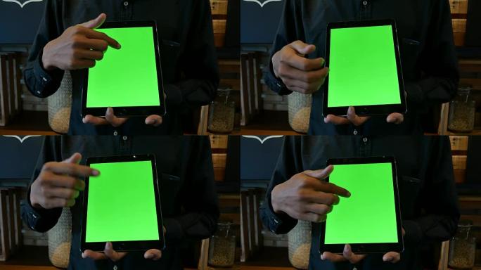 商人展示平板电脑绿屏
