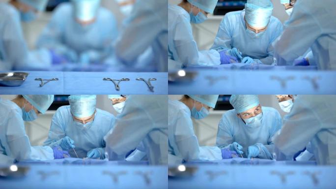 专业外科医生团队进行手术，消毒器械放在桌子上