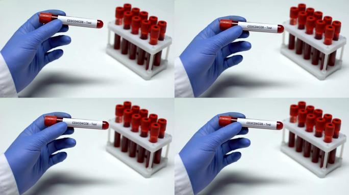 CD3 CD4 CD8，医生在试管中显示血样，实验室研究，健康检查