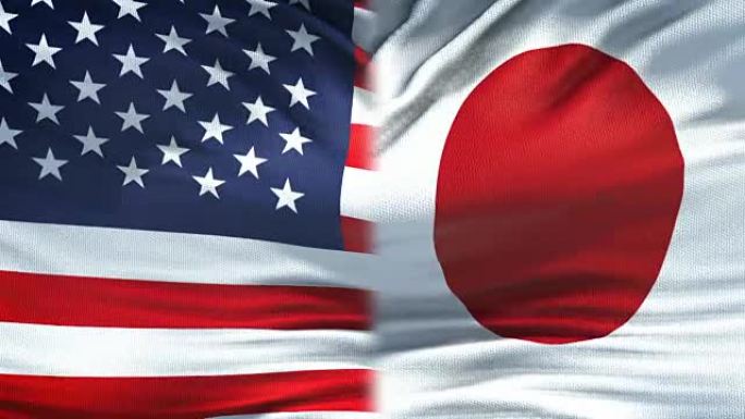 美国和日本旗帜的背景，外交和经济关系