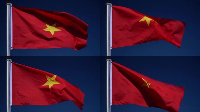 4K: 户外蓝天前旗杆上的越南国旗 (越南)