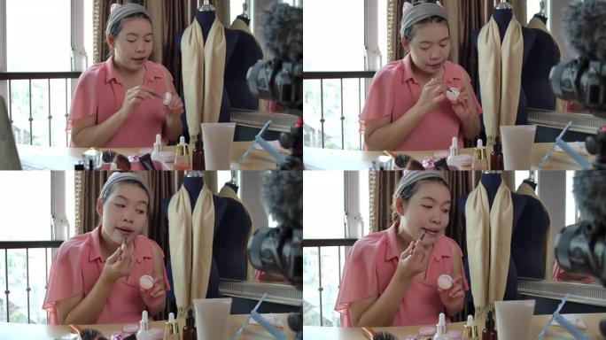 亚洲女孩她正在直播Vlog媒体到美容频道。