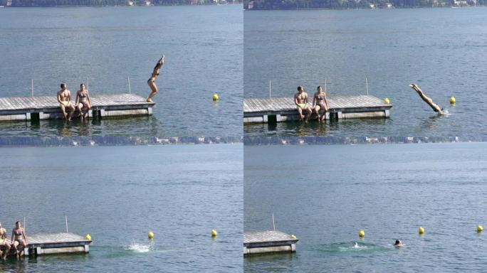 女子从湖边游泳码头跳下
