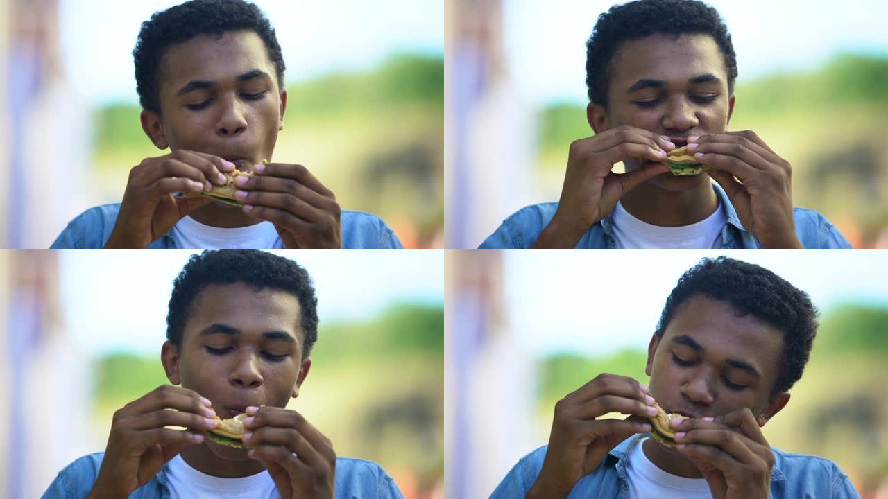 混血少年吃三明治，食欲大增，快餐，特写镜头