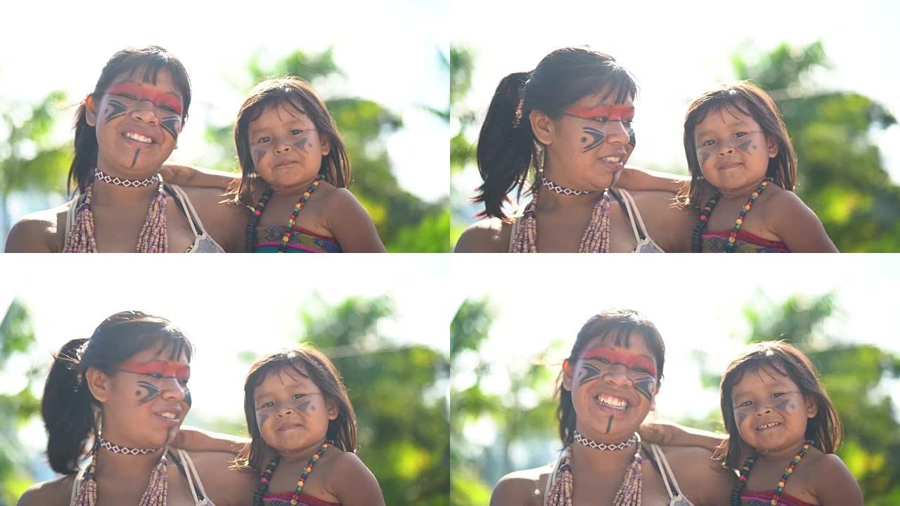 巴西土著年轻妇女和她的孩子，来自图皮瓜拉尼族的肖像