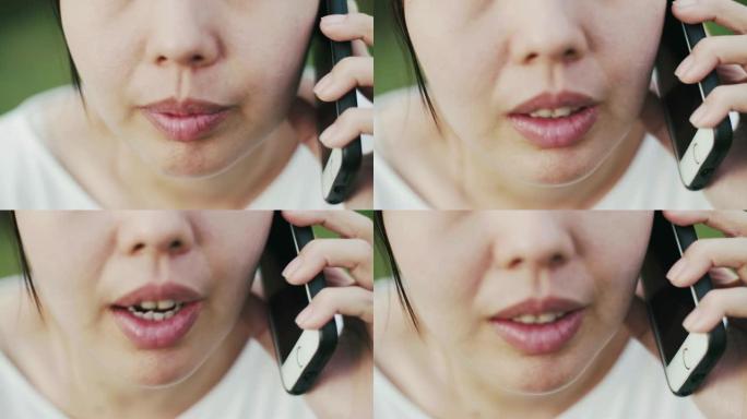 女性在手机上说话的特写镜头