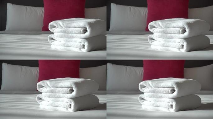 卧室内部床上装饰浴巾
