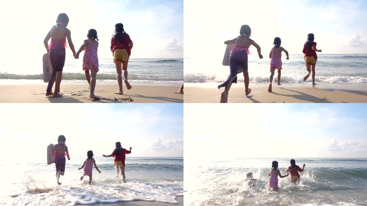 高清慢动作: 暑假在海滩上跑步的孩子们