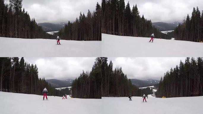 女孩正在滑雪胜地滑雪。