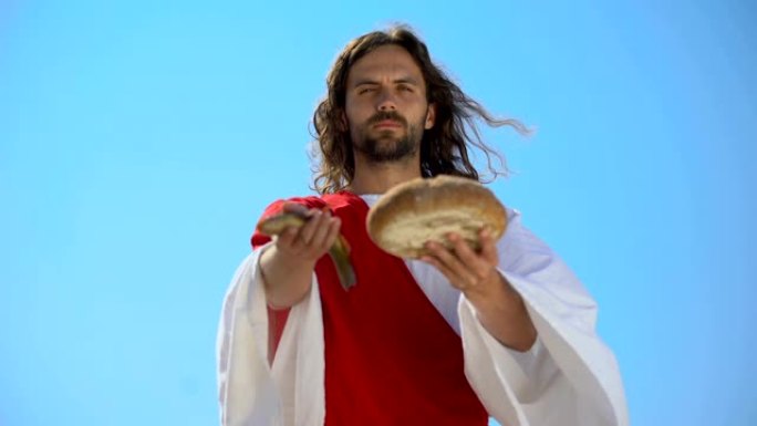 耶稣展示鱼和面包，圣经故事，关于喂养数千人的奇迹