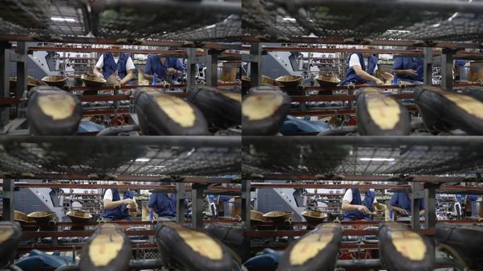 在鞋厂工作的操作员的平移视图