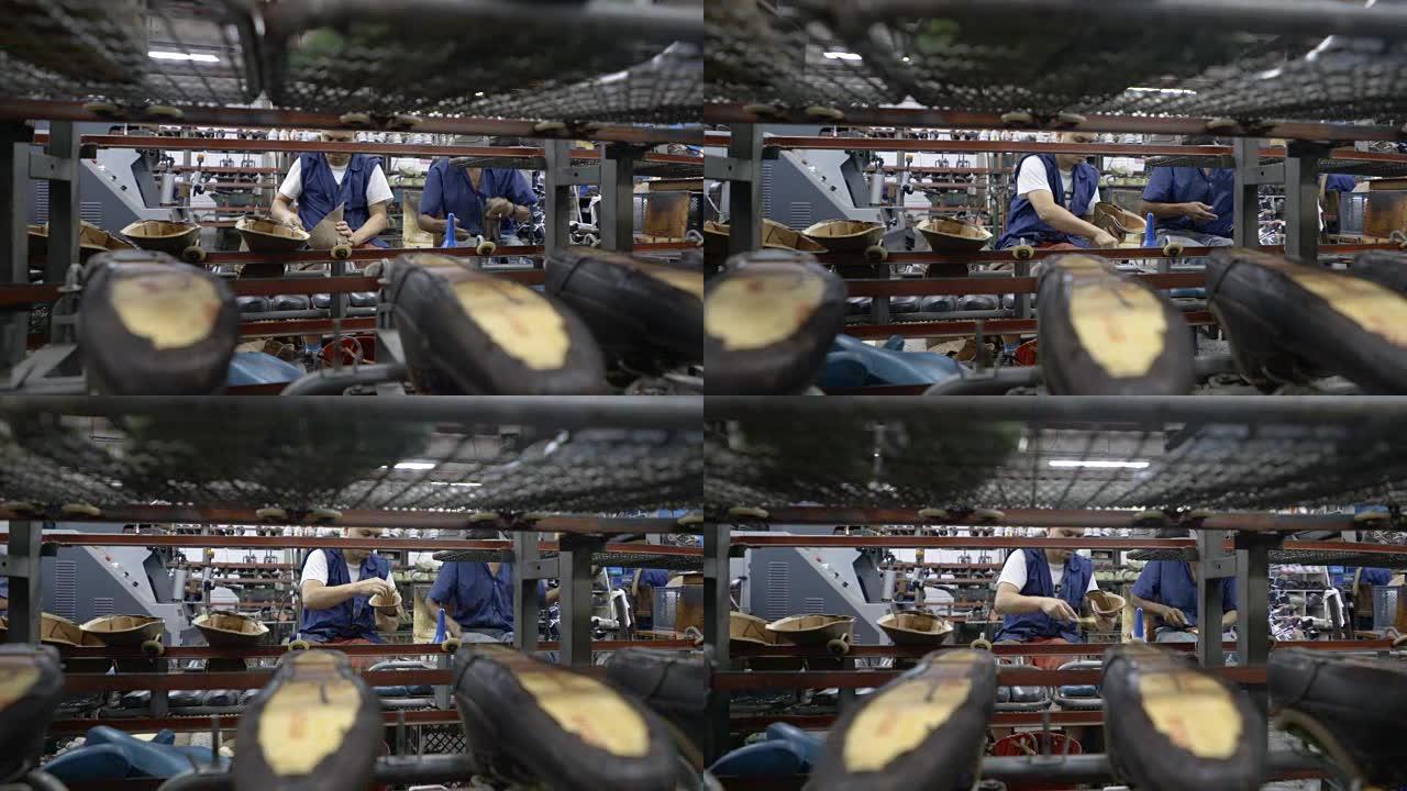 在鞋厂工作的操作员的平移视图