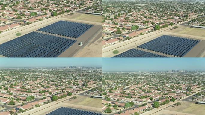 凤凰城郊区的房屋和太阳能农场与市中心的天际线