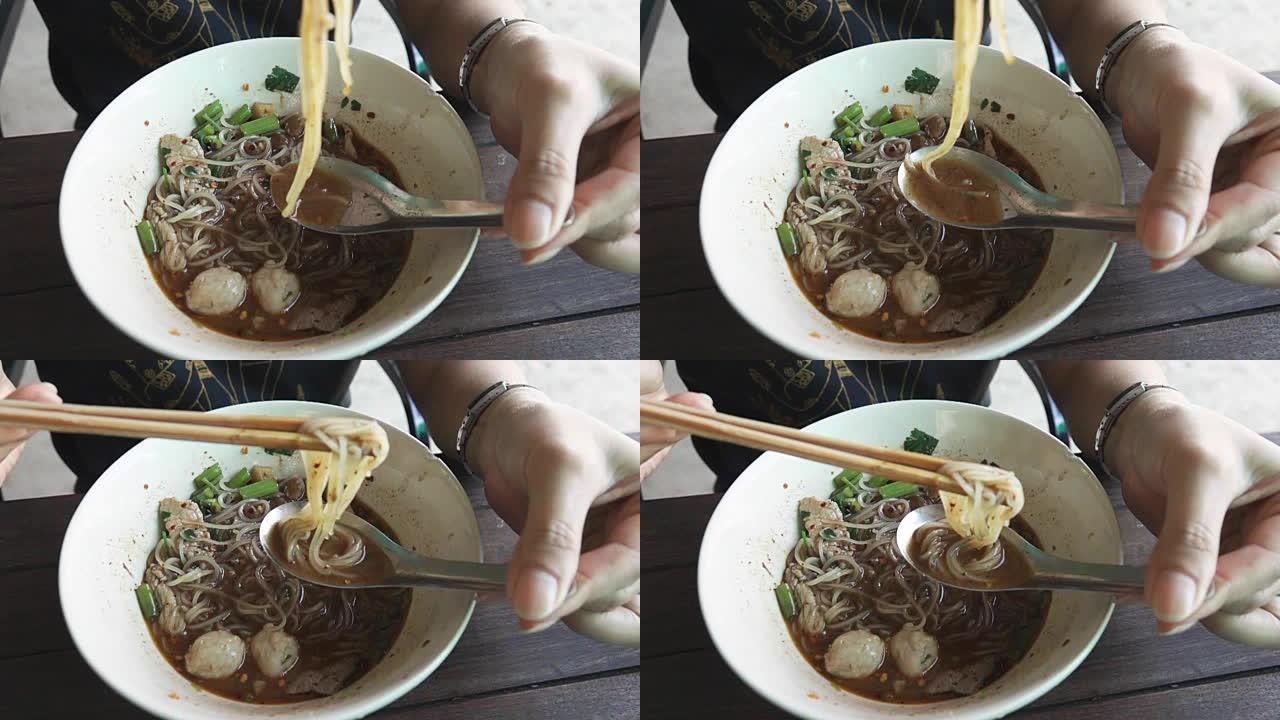 超级慢动作高清: 女人吃泰国面汤