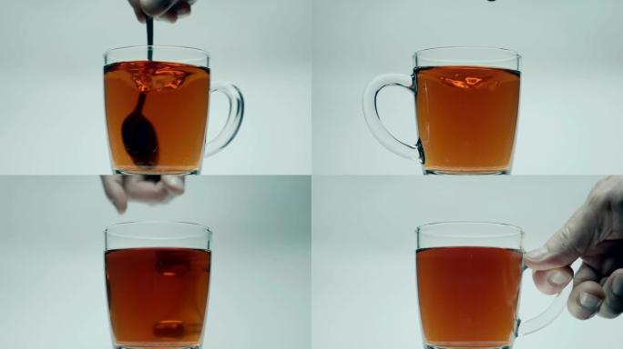 在装有茶的玻璃杯中，放一勺白糖，充分搅拌