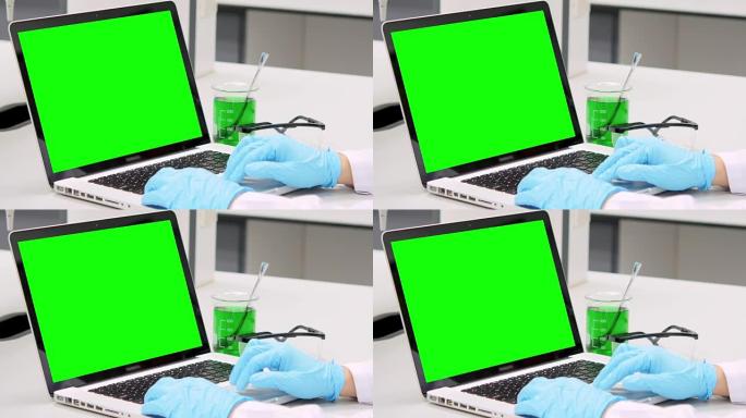 科学家正在使用绿屏笔记本电脑