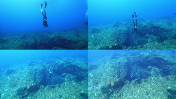 水肺潜水员游入洞中的水下慢动作镜头