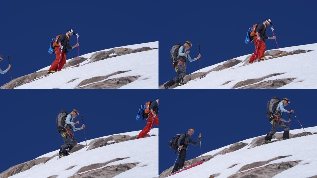 一群滑雪者在山上徒步旅行的慢动作镜头