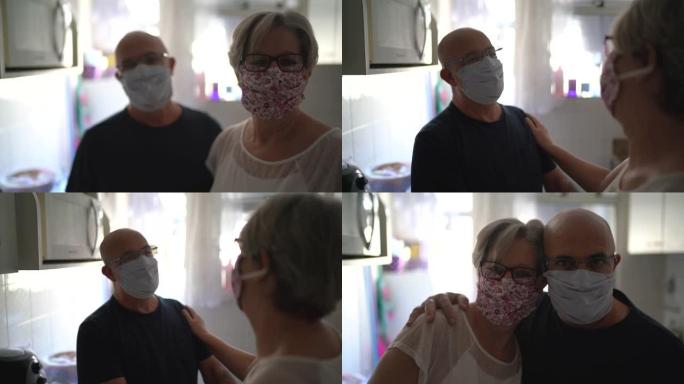 在家使用口罩的老年夫妇的肖像