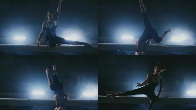 这个女孩是一名专业运动员，在背光和运动体操服装中的慢动作上表演体操杂技技巧。烟雾和蓝色。在平衡木上跳