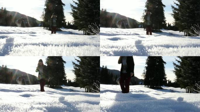 年轻女子沿着白雪皑皑的小径行走，通过电话交谈