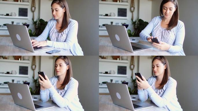 使用电脑和手机的职业女性