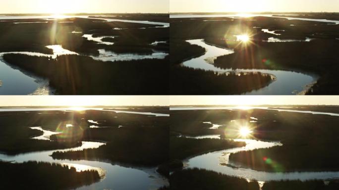 密西西比州帕斯卡古拉河三角洲的向后无人机拍摄，镜头耀斑
