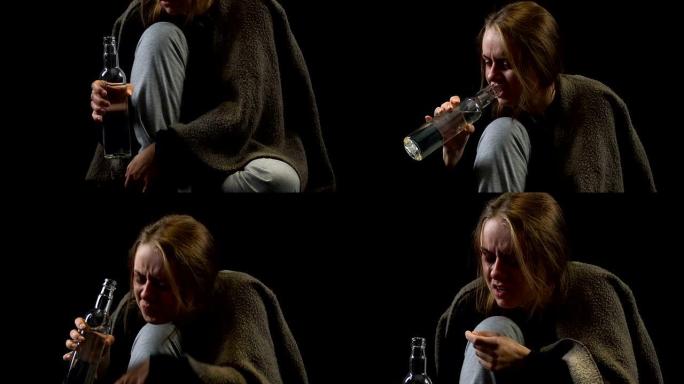 沮丧的女人喝伏特加酒，厌恶，痛苦和绝望，上瘾