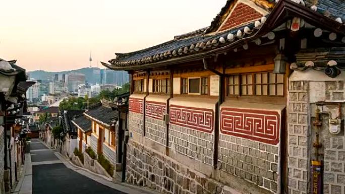 延时放大韩国首尔市北村韩屋村日出场景的镜头