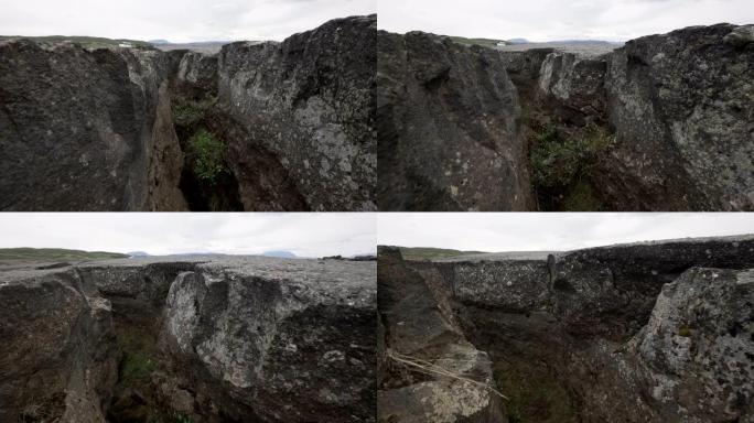 旧火山流中穿过大裂缝的手持透视图