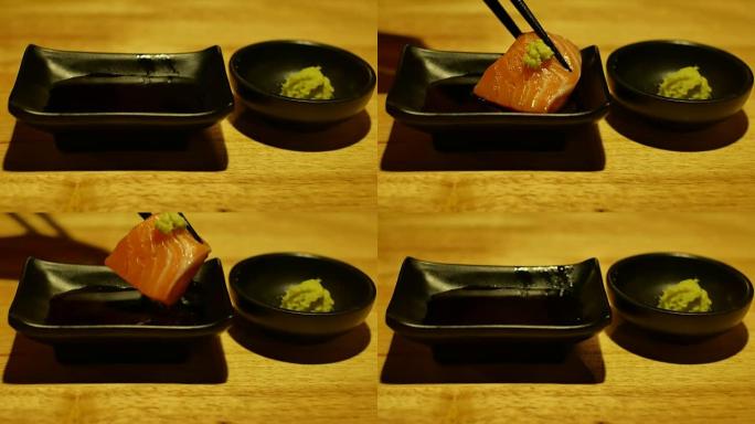 用筷子拿寿司的手