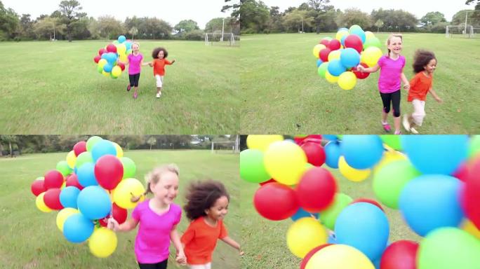 两个女孩牵着手带着一堆气球奔跑