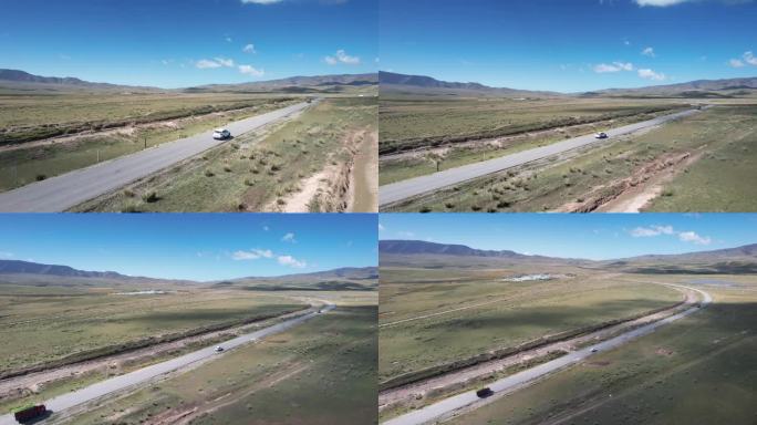 青海草原公路云层汽车航拍