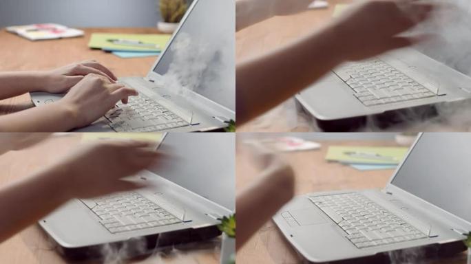 女性手在灰色笔记本电脑上打字，开始过热，女人开始惊慌