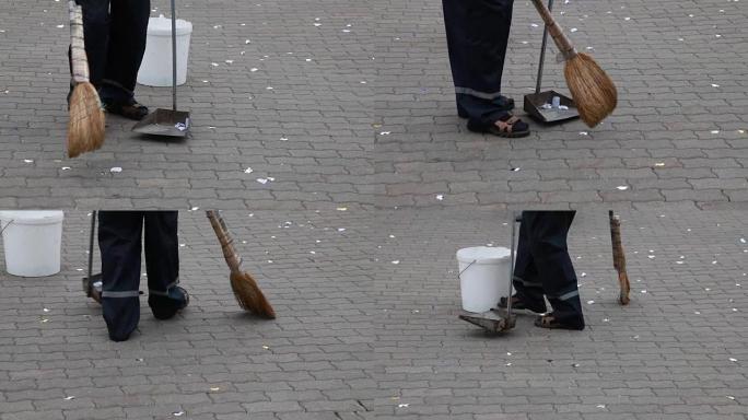 街道清洁工清扫街道上的垃圾