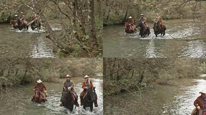 SLO MO DS三个牧民在河里骑马