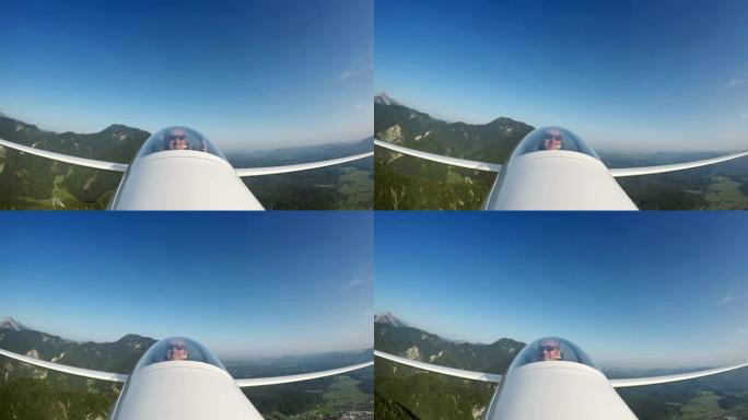 驾驶飞机上的LD飞行员在阳光下高高飞行时说话