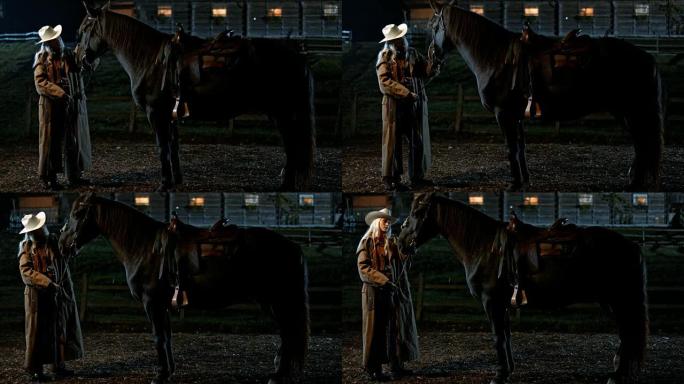 SLO MO DS女牛仔在晚上抚摸她的马