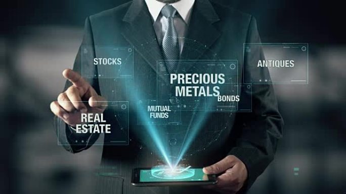 贵金属投资成功概念商人使用数字平板电脑技术未来背景