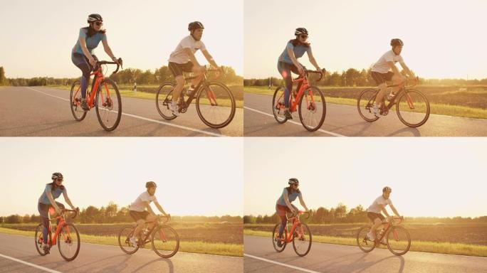 Steadicam拍摄了两个健康的男人和女人在日落时用自行车公路自行车快速兜售的照片。