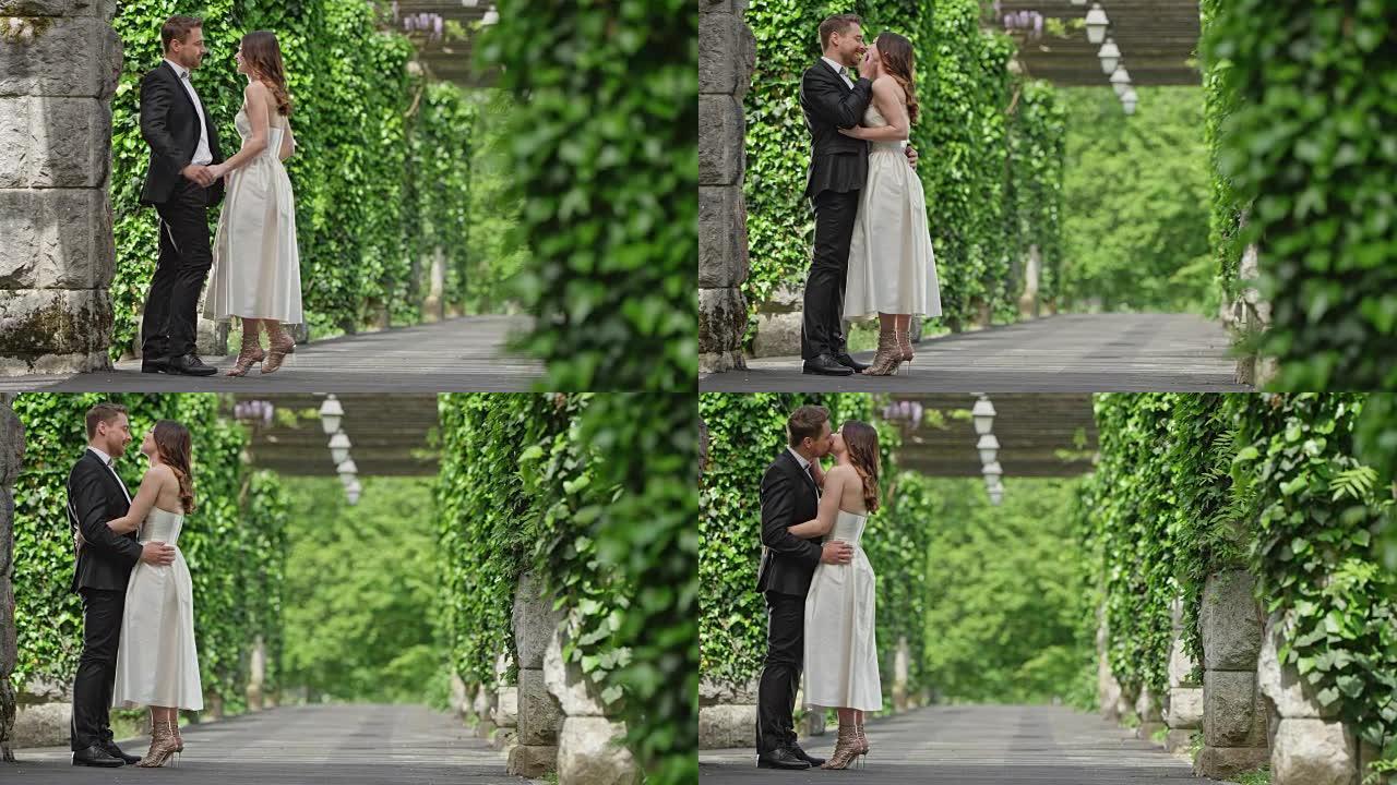 SLO MO DS新娘和新郎在美丽的通道中接吻