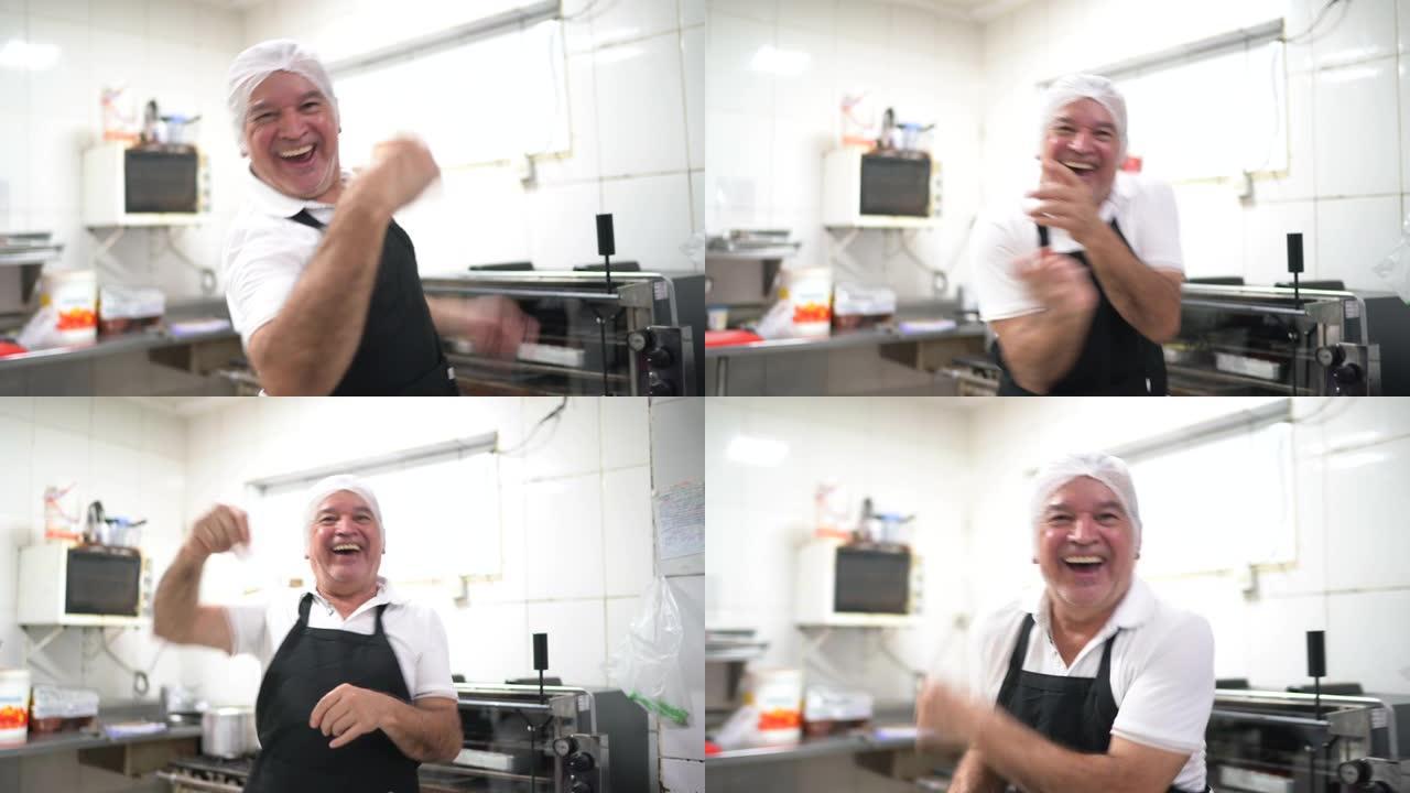 厨师在餐厅的工业厨房跳舞