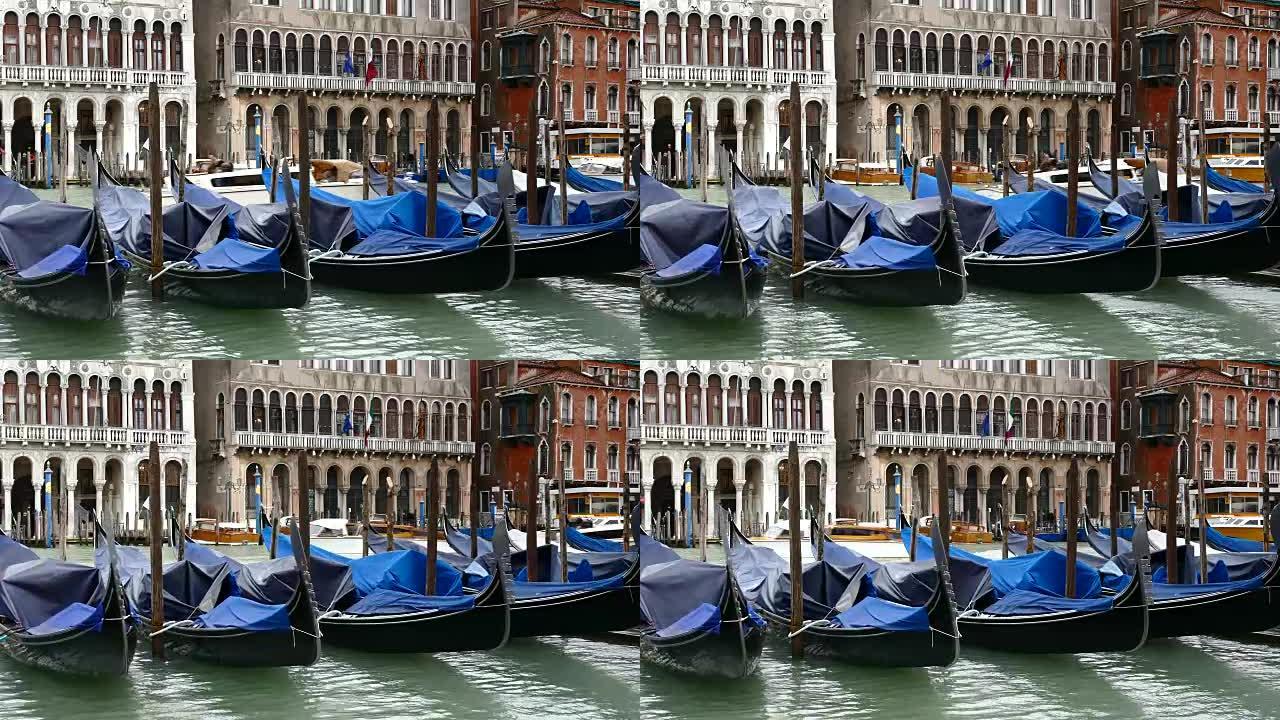 意大利威尼斯大运河上的4k蓝色吊船等待游客